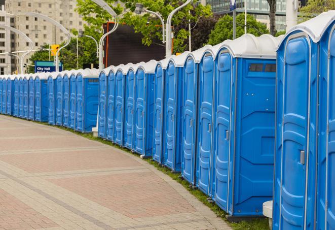 a row of portable restrooms at an outdoor special event, ready for use in Sheridan MT